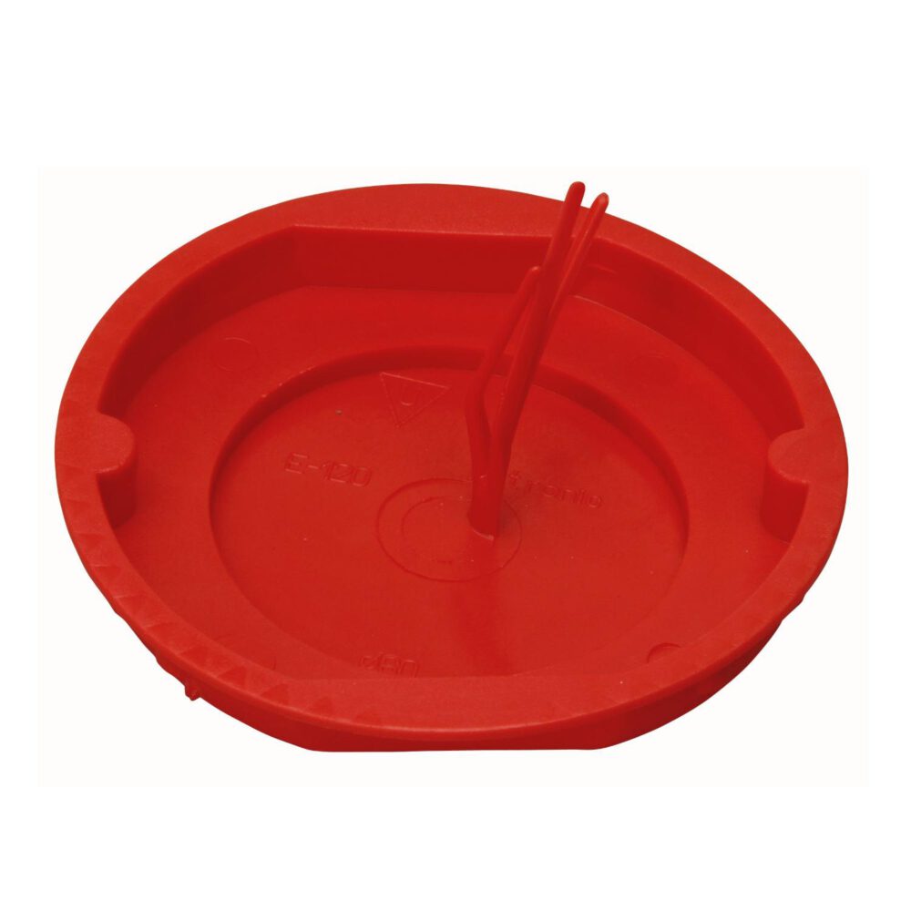 Ein runder, roter Kopp Signaldeckel für Schalterdose 60 mm mit einem eingebauten Rührstäbchen, das oben quer liegt und in zwei kleinen Schlitzen befestigt ist.